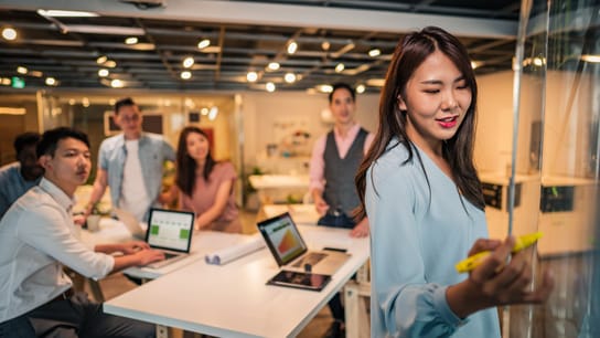 Young group of people working in modern office