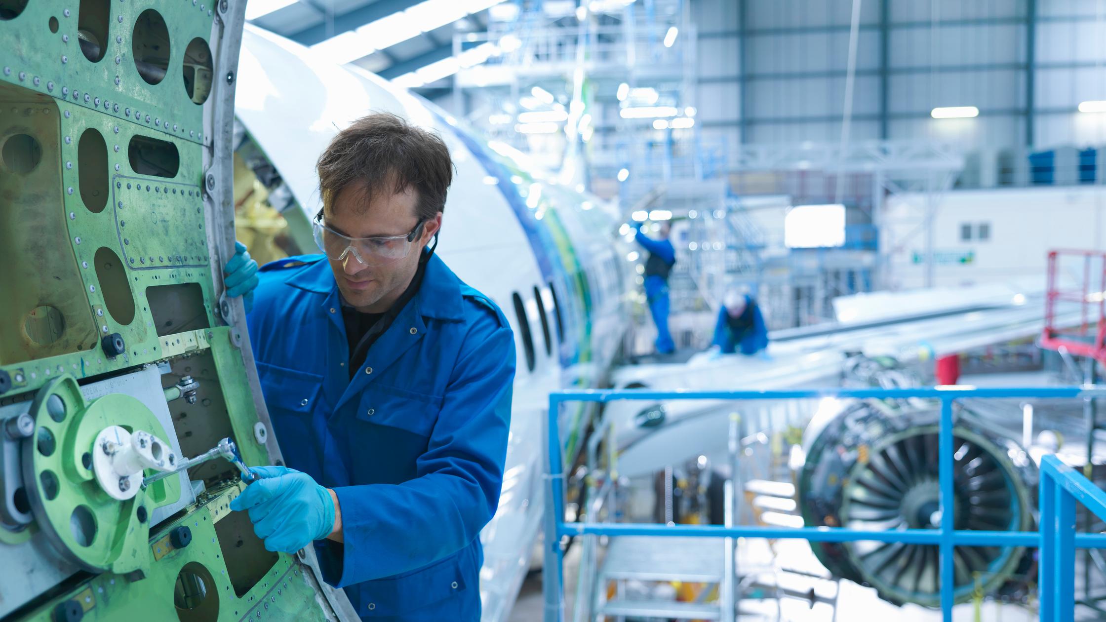 transport and mobility engineer working on aircraft